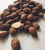 Dark brown roasted almond nuts