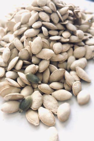 Bright white seeds in a large pile.