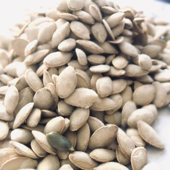 Bright white seeds in a large pile.